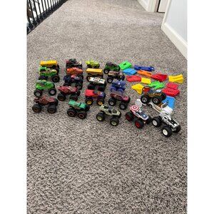 MONSTER TRUCKS LOT OF 23 VARIOUS TRUCKS COLLECTION